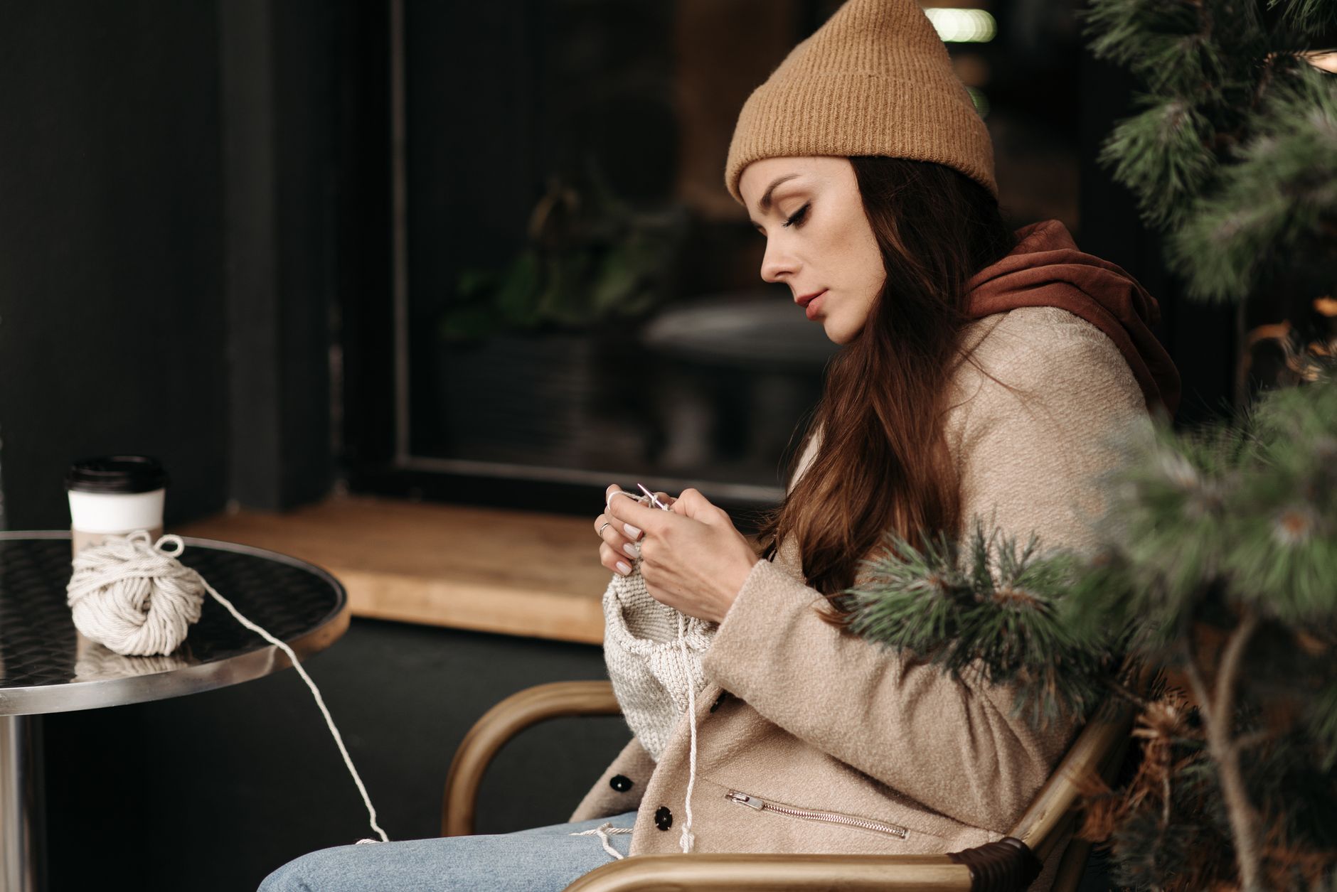 A wool overcoat draped on a bench