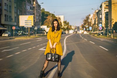 A New York runway model in an editorial coat