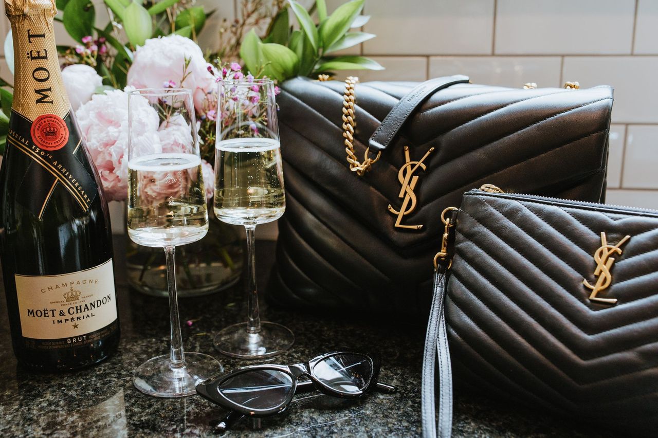 A luxury designer handbag on marble