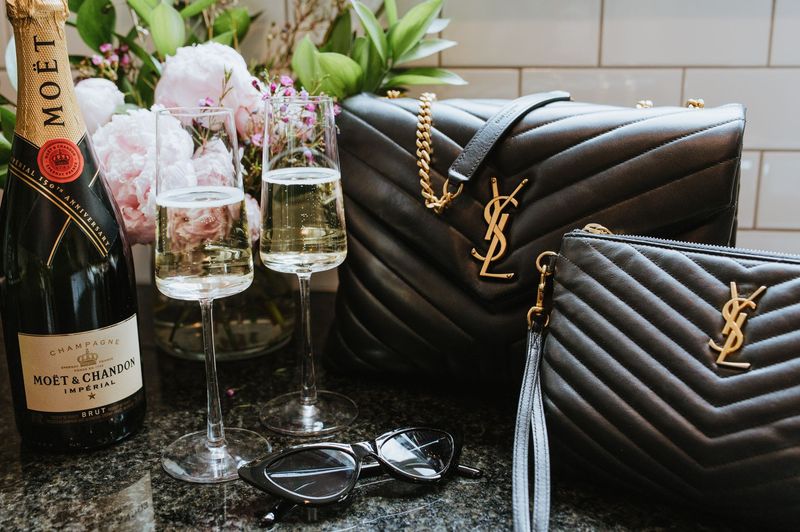 A luxury designer handbag on marble