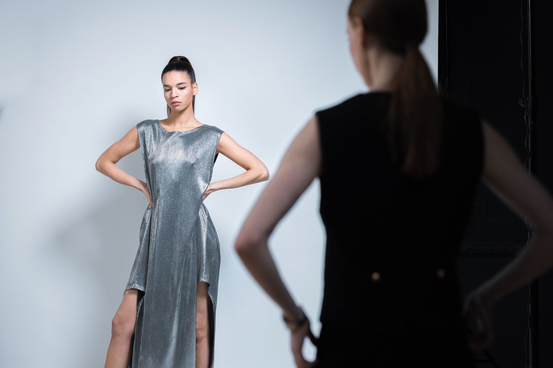 Backstage models preparing for the runway