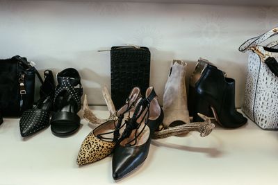 A collection of luxury heritage handbags on a shelf