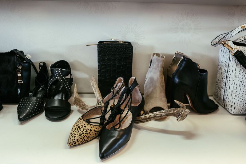 A collection of luxury heritage handbags on a shelf