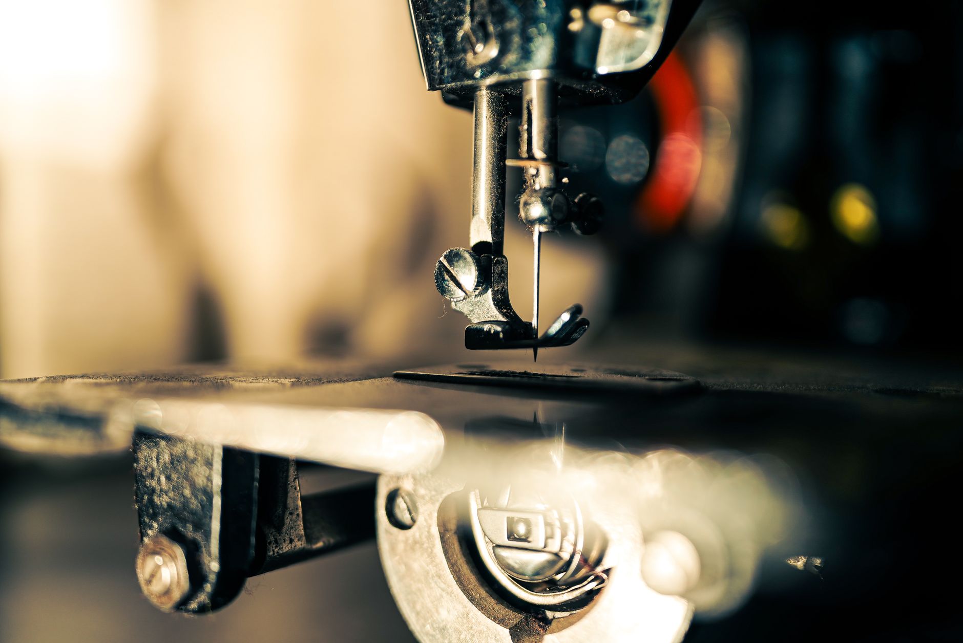 A sewing machine with fabric being sewn