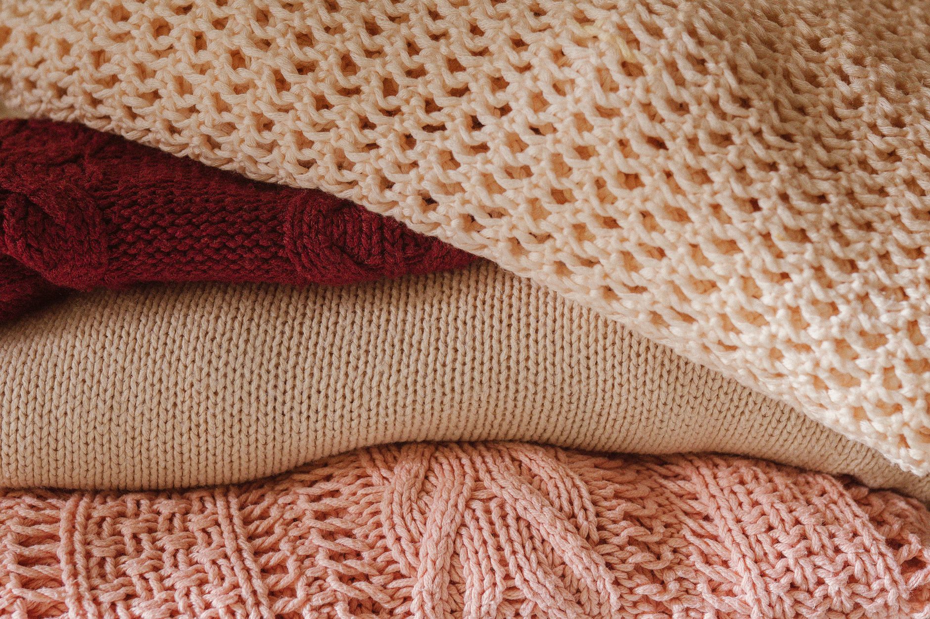Close up of a cashmere sweater with visible stitching
