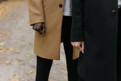 A minimalist wool coat and cashmere sweater