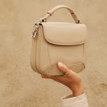 Coach Tabby bag in luxury fashion editorial setting