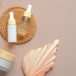Luxury skincare products flatlay Drunk Elephant Glossier Westman Atelier