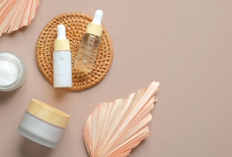 Luxury skincare products flatlay Drunk Elephant Glossier Westman Atelier