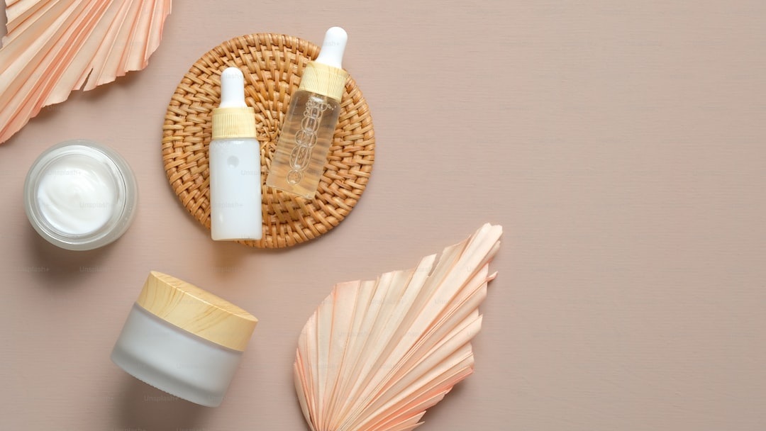 Luxury skincare products flatlay Drunk Elephant Glossier Westman Atelier