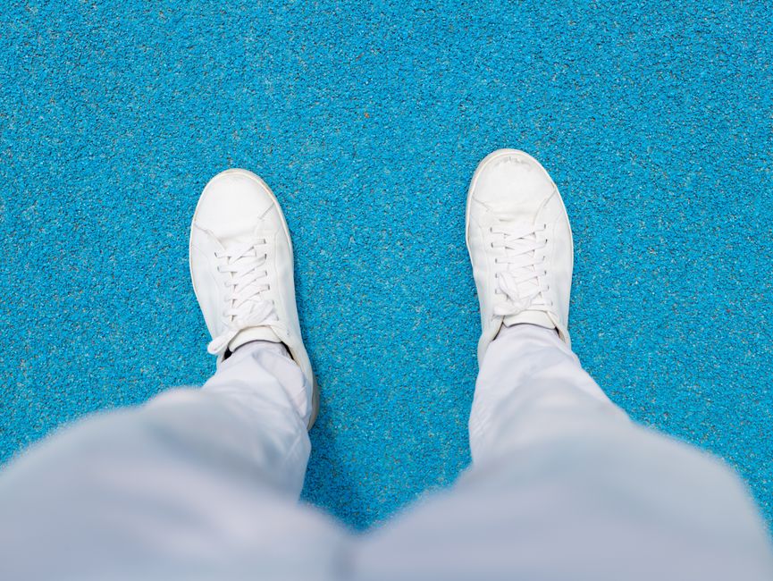 clean white walking sneaker